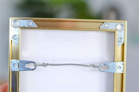 metal brackets with holes in picture frames|metal frame picture hangers instructions.